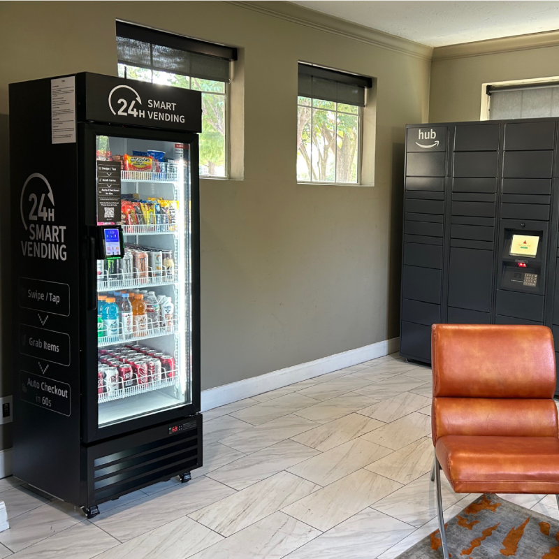 24H Smart Vending cooler in residential lobby beside Amazon Hub lockers